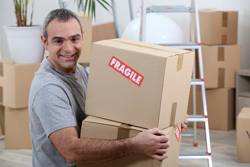 Man and van loading furniture for a local move in Wennington