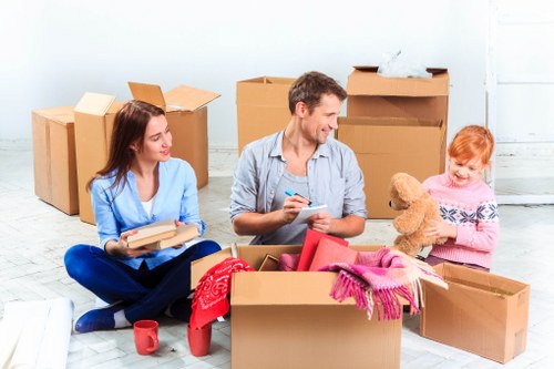 Local moving team preparing boxes for a home or office relocation in Wennington
