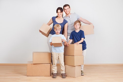 Loading furniture into a removal truck for a Wennington property move