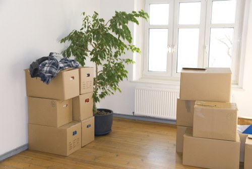 Packed boxes and household items ready for transport in Wennington