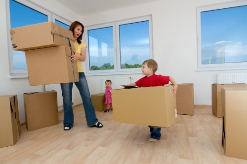 Packed moving boxes and furniture ready for house removal