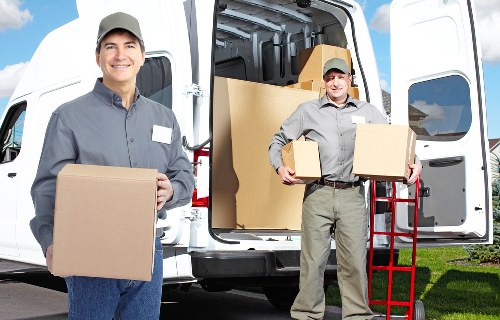 Preparation checklist scene with labelled moving boxes and packing materials