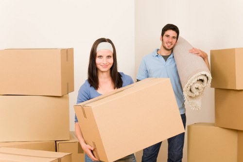 Boxes and furniture arranged for a removal service in Wennington